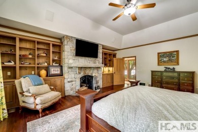 Situated on a large lot, prominently overlooking the 10th golf on Wade Hampton Golf Club in North Carolina - for sale on GolfHomes.com, golf home, golf lot