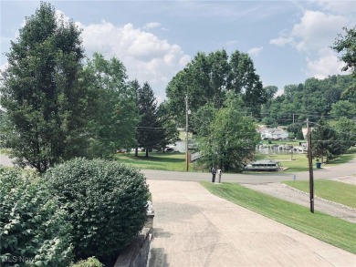 Welcome to 411 E. Mohawk Dr., Malvern. Nestled in the private on Lake Mohawk Golf Club in Ohio - for sale on GolfHomes.com, golf home, golf lot