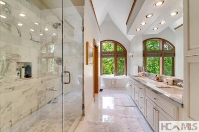 Situated on a large lot, prominently overlooking the 10th golf on Wade Hampton Golf Club in North Carolina - for sale on GolfHomes.com, golf home, golf lot