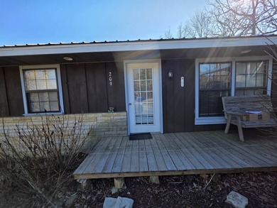 Super-cute, Cypress & Stone home with 3 bedrooms, 2 baths and on The Course At Turkey Mountain in Arkansas - for sale on GolfHomes.com, golf home, golf lot