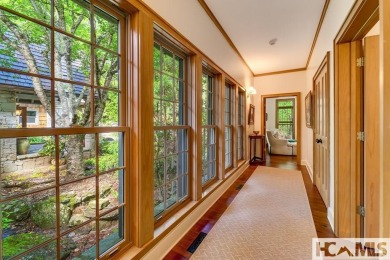 Situated on a large lot, prominently overlooking the 10th golf on Wade Hampton Golf Club in North Carolina - for sale on GolfHomes.com, golf home, golf lot
