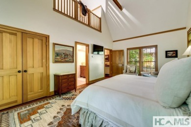 Situated on a large lot, prominently overlooking the 10th golf on Wade Hampton Golf Club in North Carolina - for sale on GolfHomes.com, golf home, golf lot