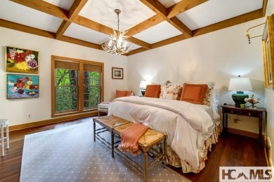 Situated on a large lot, prominently overlooking the 10th golf on Wade Hampton Golf Club in North Carolina - for sale on GolfHomes.com, golf home, golf lot