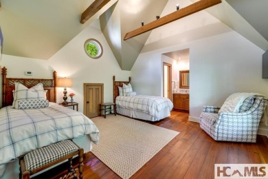 Situated on a large lot, prominently overlooking the 10th golf on Wade Hampton Golf Club in North Carolina - for sale on GolfHomes.com, golf home, golf lot