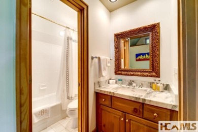 Situated on a large lot, prominently overlooking the 10th golf on Wade Hampton Golf Club in North Carolina - for sale on GolfHomes.com, golf home, golf lot
