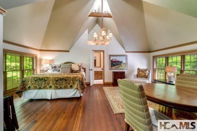 Situated on a large lot, prominently overlooking the 10th golf on Wade Hampton Golf Club in North Carolina - for sale on GolfHomes.com, golf home, golf lot