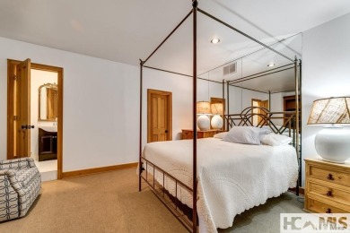 Situated on a large lot, prominently overlooking the 10th golf on Wade Hampton Golf Club in North Carolina - for sale on GolfHomes.com, golf home, golf lot