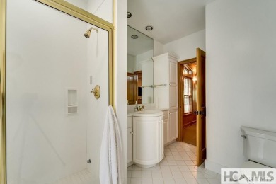 Situated on a large lot, prominently overlooking the 10th golf on Wade Hampton Golf Club in North Carolina - for sale on GolfHomes.com, golf home, golf lot
