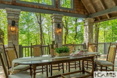 Situated on a large lot, prominently overlooking the 10th golf on Wade Hampton Golf Club in North Carolina - for sale on GolfHomes.com, golf home, golf lot