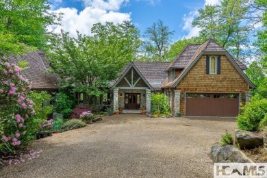 Situated on a large lot, prominently overlooking the 10th golf on Wade Hampton Golf Club in North Carolina - for sale on GolfHomes.com, golf home, golf lot