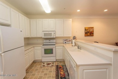 Enjoy easy, low-maintenance living in this beautifully on Crow Creek Golf Club in North Carolina - for sale on GolfHomes.com, golf home, golf lot