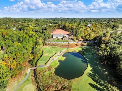 Tucked among mature trees and backing to the Rivermont golf on Rivermont Golf and Country Club in Georgia - for sale on GolfHomes.com, golf home, golf lot