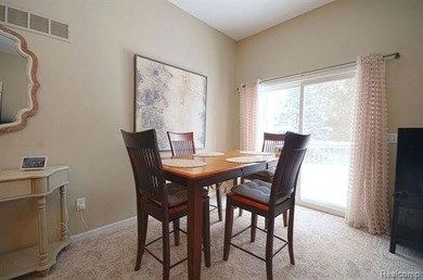 This lovely condo located directly across from White Lake Oaks on White Lake Oaks Golf Course in Michigan - for sale on GolfHomes.com, golf home, golf lot