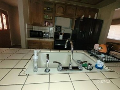 Large and spacious home with 3 BR/ 2 Ba, office, indoor laundry on Tierra Del Sol Golf Course in California - for sale on GolfHomes.com, golf home, golf lot