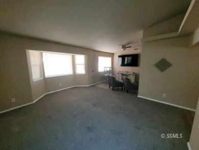 Large and spacious home with 3 BR/ 2 Ba, office, indoor laundry on Tierra Del Sol Golf Course in California - for sale on GolfHomes.com, golf home, golf lot