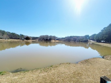 This flat, wooded lot 40 off Stillwaters Drive offers the on Stillwaters Golf and Country Club in Alabama - for sale on GolfHomes.com, golf home, golf lot