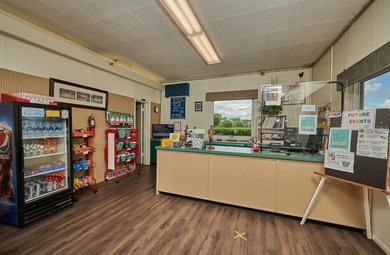 Build your dream home on this half-acre lot in the lake and golf on Indian Lake Estates Golf and Country Club in Florida - for sale on GolfHomes.com, golf home, golf lot