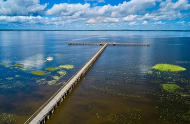 Build your dream home on this half-acre lot in the lake and golf on Indian Lake Estates Golf and Country Club in Florida - for sale on GolfHomes.com, golf home, golf lot