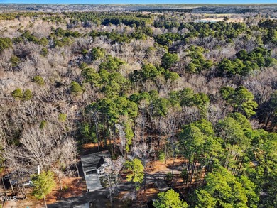Discover the perfect opportunity to build in a sought-after on Carolina Trace Country Club in North Carolina - for sale on GolfHomes.com, golf home, golf lot