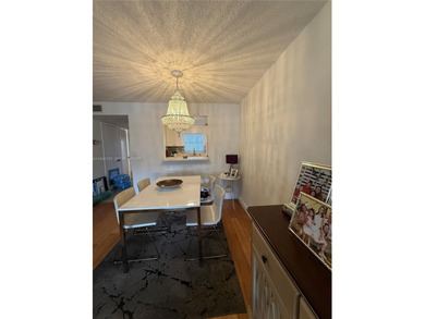 One bedroom one and a half bedroom condo in resort like + on Sunrise Lakes Phase III in Florida - for sale on GolfHomes.com, golf home, golf lot