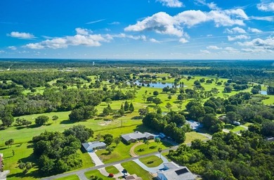 Build your dream home on this half-acre lot in the lake and golf on Indian Lake Estates Golf and Country Club in Florida - for sale on GolfHomes.com, golf home, golf lot