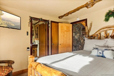 Beautiful log home with an amazing view to the west, located on on Big Bear Mountain Ski and Golf Resort in California - for sale on GolfHomes.com, golf home, golf lot