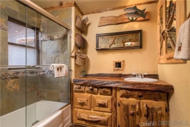 Beautiful log home with an amazing view to the west, located on on Big Bear Mountain Ski and Golf Resort in California - for sale on GolfHomes.com, golf home, golf lot