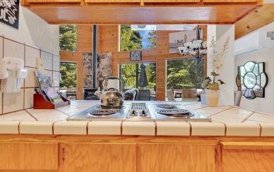Experience the perfect mountain lifestyle in this wonderful Lake on Lake Almanor West Golf Course in California - for sale on GolfHomes.com, golf home, golf lot