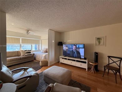 One bedroom one and a half bedroom condo in resort like + on Sunrise Lakes Phase III in Florida - for sale on GolfHomes.com, golf home, golf lot