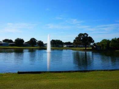 Well maintained 3 bedroom/2bath 2001 Home of Merit home located on Four Lakes Golf Club in Florida - for sale on GolfHomes.com, golf home, golf lot
