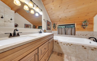 Experience the perfect mountain lifestyle in this wonderful Lake on Lake Almanor West Golf Course in California - for sale on GolfHomes.com, golf home, golf lot