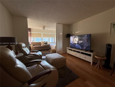 One bedroom one and a half bedroom condo in resort like + on Sunrise Lakes Phase III in Florida - for sale on GolfHomes.com, golf home, golf lot