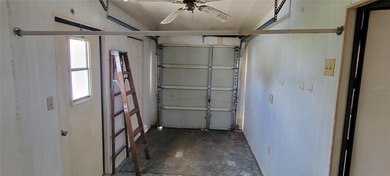 Welcome home to this charming 940 sq. ft., 2-bedroom, 1-bath on Orange Blossom Hills Golf and Country Club in Florida - for sale on GolfHomes.com, golf home, golf lot