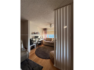 One bedroom one and a half bedroom condo in resort like + on Sunrise Lakes Phase III in Florida - for sale on GolfHomes.com, golf home, golf lot