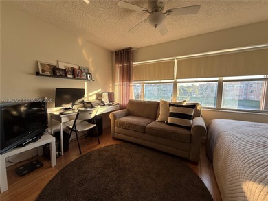 One bedroom one and a half bedroom condo in resort like + on Sunrise Lakes Phase III in Florida - for sale on GolfHomes.com, golf home, golf lot