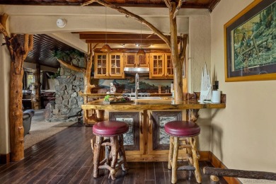 Beautiful log home with an amazing view to the west, located on on Big Bear Mountain Ski and Golf Resort in California - for sale on GolfHomes.com, golf home, golf lot