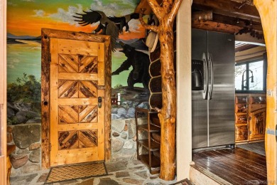 Beautiful log home with an amazing view to the west, located on on Big Bear Mountain Ski and Golf Resort in California - for sale on GolfHomes.com, golf home, golf lot