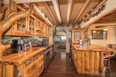 Beautiful log home with an amazing view to the west, located on on Big Bear Mountain Ski and Golf Resort in California - for sale on GolfHomes.com, golf home, golf lot