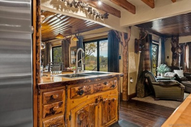 Beautiful log home with an amazing view to the west, located on on Big Bear Mountain Ski and Golf Resort in California - for sale on GolfHomes.com, golf home, golf lot