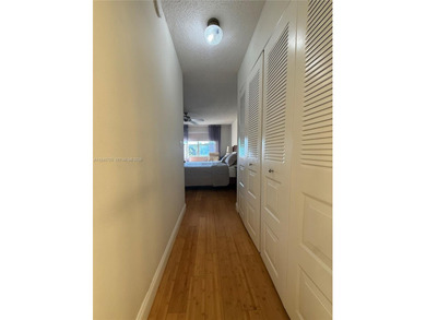 One bedroom one and a half bedroom condo in resort like + on Sunrise Lakes Phase III in Florida - for sale on GolfHomes.com, golf home, golf lot