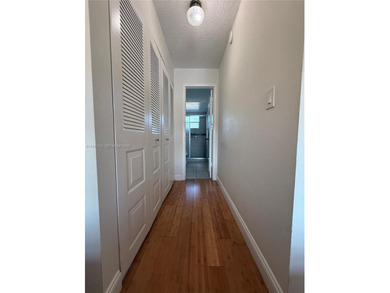 One bedroom one and a half bedroom condo in resort like + on Sunrise Lakes Phase III in Florida - for sale on GolfHomes.com, golf home, golf lot