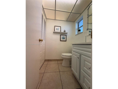 One bedroom one and a half bedroom condo in resort like + on Sunrise Lakes Phase III in Florida - for sale on GolfHomes.com, golf home, golf lot