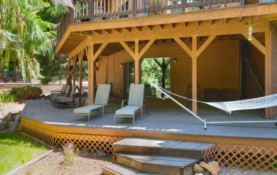 Experience the perfect mountain lifestyle in this wonderful Lake on Lake Almanor West Golf Course in California - for sale on GolfHomes.com, golf home, golf lot