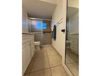 One bedroom one and a half bedroom condo in resort like + on Sunrise Lakes Phase III in Florida - for sale on GolfHomes.com, golf home, golf lot