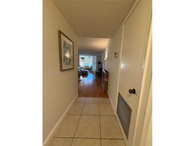 One bedroom one and a half bedroom condo in resort like + on Sunrise Lakes Phase III in Florida - for sale on GolfHomes.com, golf home, golf lot