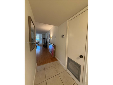 One bedroom one and a half bedroom condo in resort like + on Sunrise Lakes Phase III in Florida - for sale on GolfHomes.com, golf home, golf lot