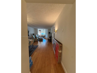 One bedroom one and a half bedroom condo in resort like + on Sunrise Lakes Phase III in Florida - for sale on GolfHomes.com, golf home, golf lot