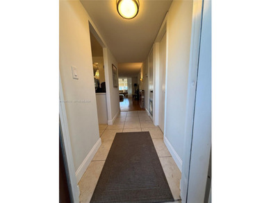 One bedroom one and a half bedroom condo in resort like + on Sunrise Lakes Phase III in Florida - for sale on GolfHomes.com, golf home, golf lot