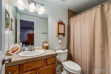 Welcome to this spacious ranch-style townhome near Buffalo Run! on Buffalo Run Golf Course in Colorado - for sale on GolfHomes.com, golf home, golf lot