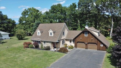 This unique Cape Cod is located in the Gottscheer Country Club on Osiris Country Club in New York - for sale on GolfHomes.com, golf home, golf lot